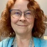 Headshot of Penny Hillemann, former board chair of Minnesota Bluegrass Association